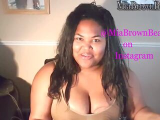 Mia pumps and feelings milk out of her big brown tits