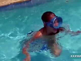 Incredible brunette slattern Candy swims underwater